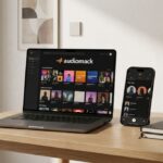 Audiomack playing on laptop and mobile