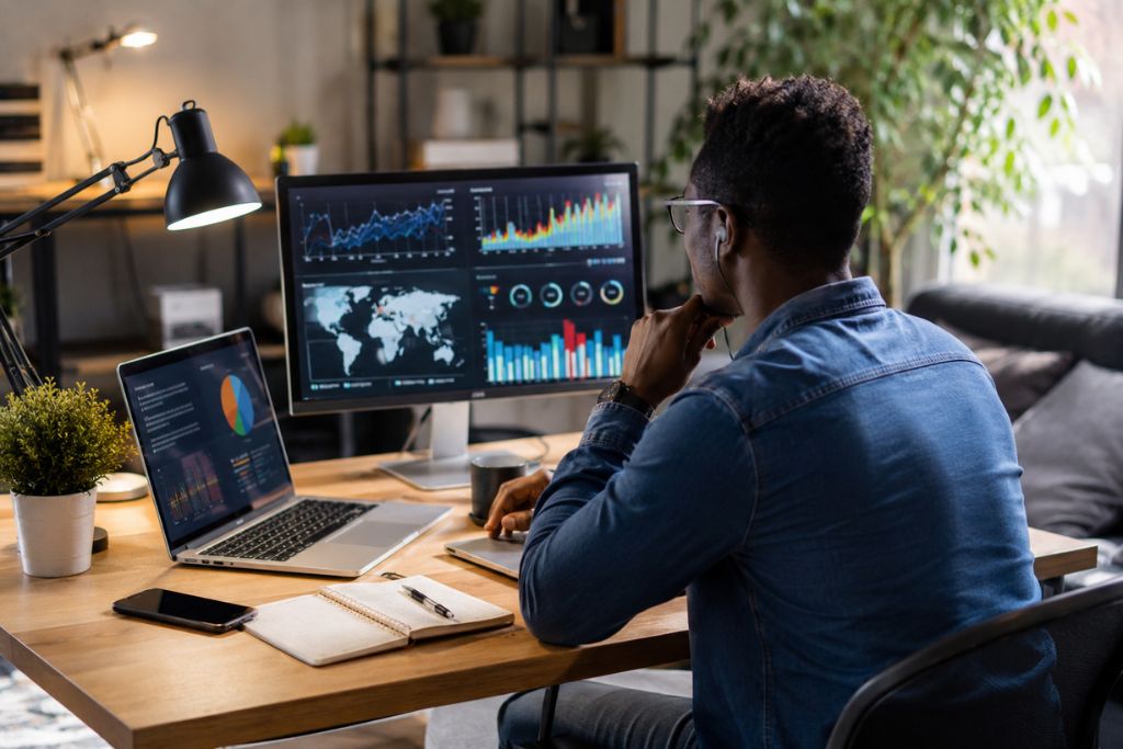 A young man working remotely as an AI and Data Analysis expert